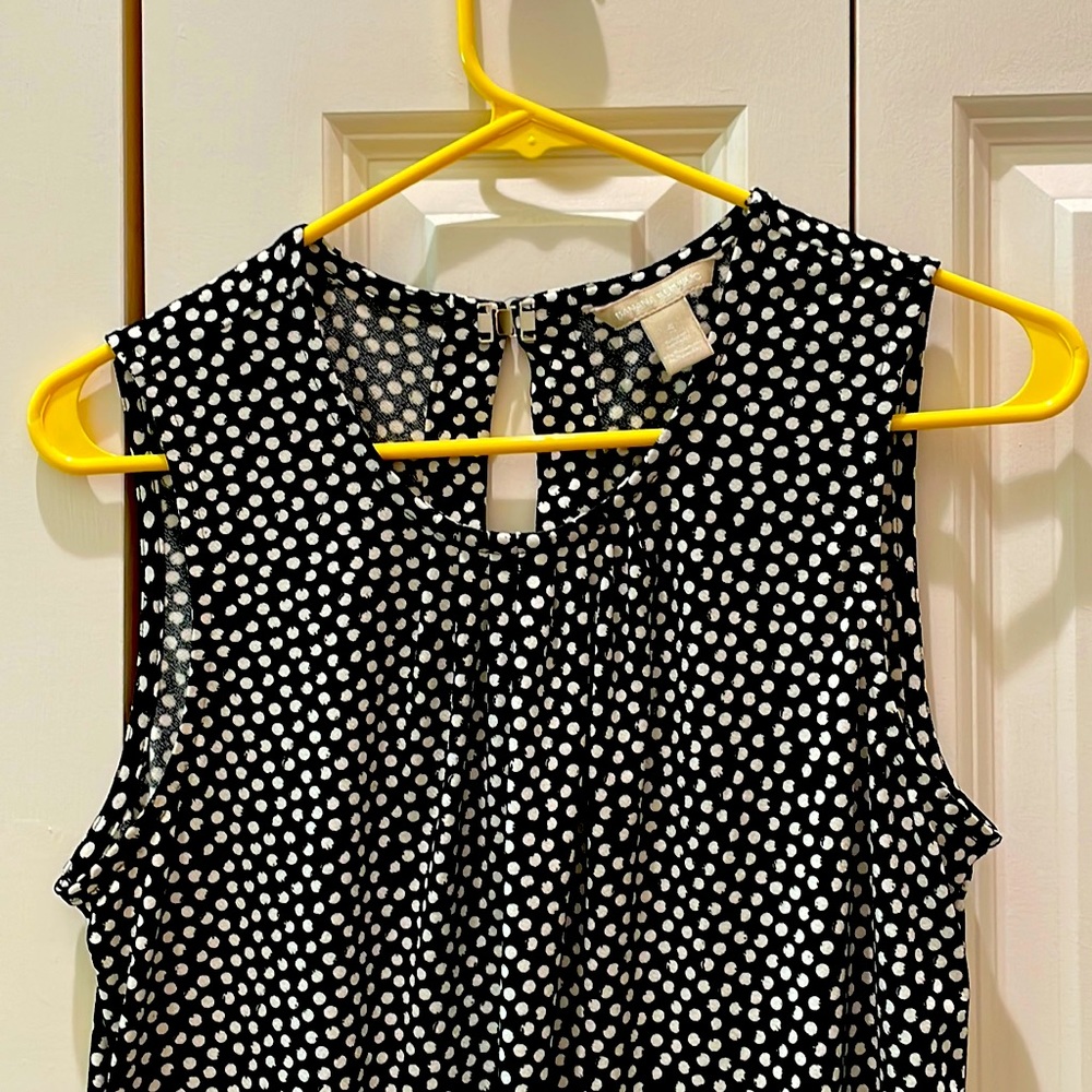 Cute  top. Literally only worn a few times ; no holes, rips or fading.